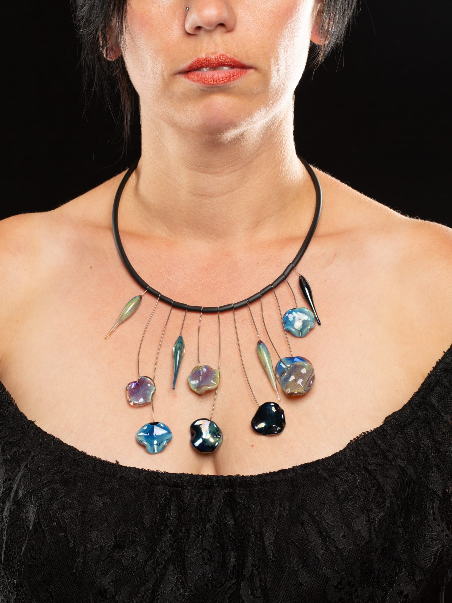 Collier paon sur modele